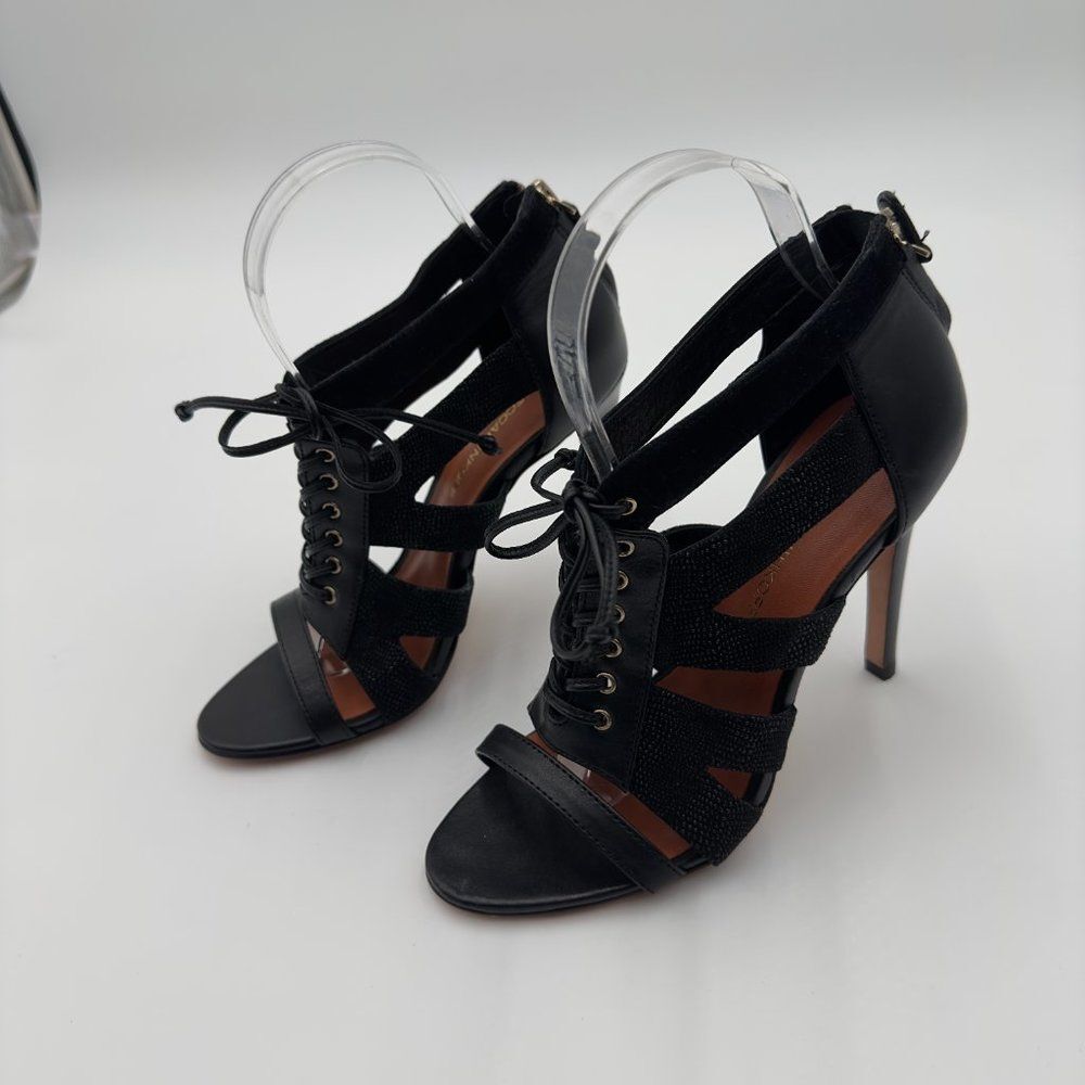 Rebecca Minkoff Black strappy leather heel size 7M, with heel of 4"